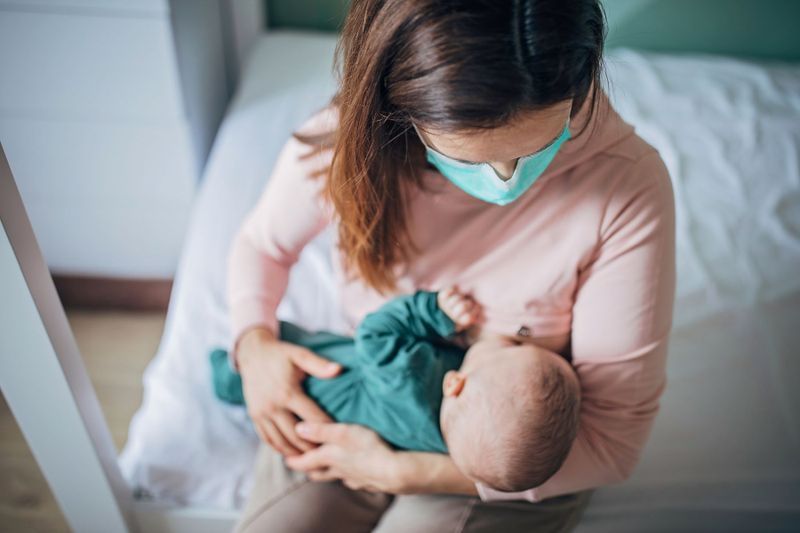 Study MaskWearing Moms with COVID19 Can Safely Nurse Babies The