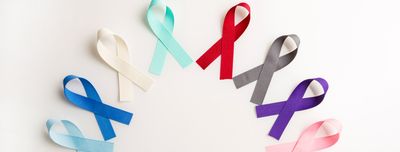 Semi-circle of colorful cancer awareness ribbons