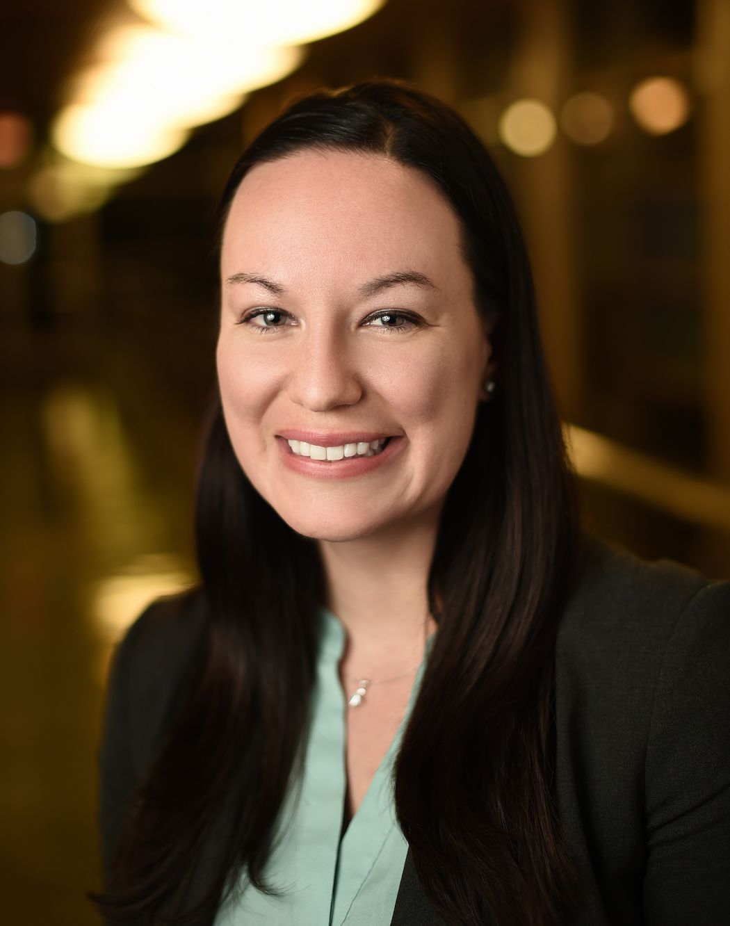 A photograph of Carolyn Schutt Ibsen, a biomedical engineer at the Oregon Health and Science University. She is wearing a teal shirt and black blazer and has straight black hair. A photograph of Carolyn Schutt Ibsen, a biomedical engineer at the Oregon Health and Science University. She is wearing a teal shirt and black blazer and has straight black hair.