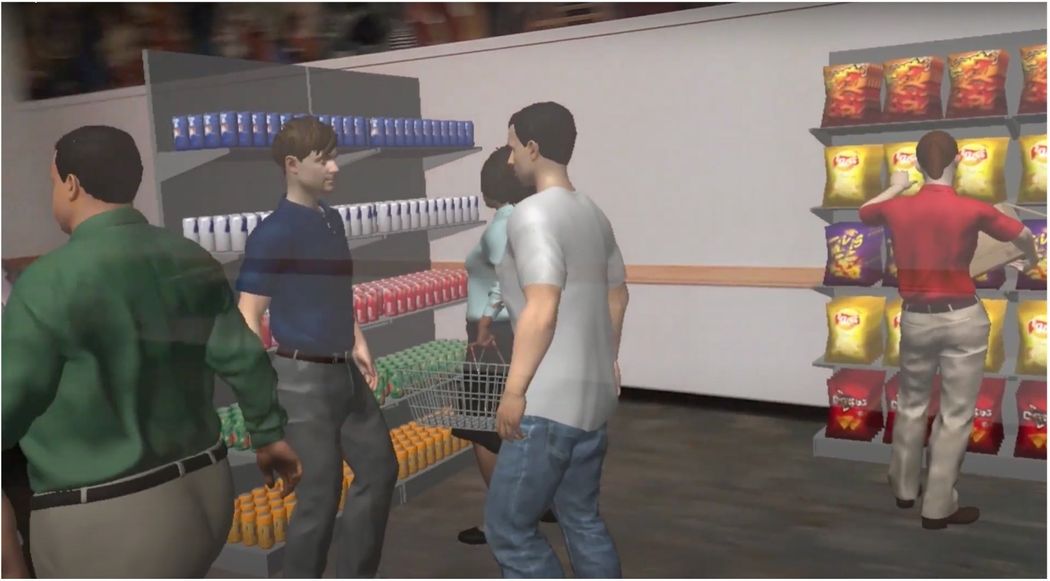Photo of a user’s view wearing an AR headset depicting a grocery store. Within the participant’s real-world view of a carpeted room with white walls, there are simulations of grocery shelves holding beverages and chips, with simulated avatars of shoppers and employees. Photo of a user’s view wearing an AR headset depicting a grocery store. Within the participant’s real-world view of a carpeted room with white walls, there are simulations of grocery shelves holding beverages and chips, with simulated avatars of shoppers and employees.