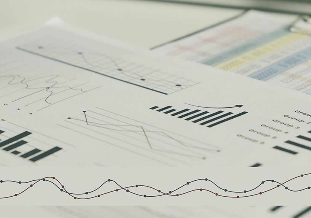 Data presented using various visualization formats on a piece of paper.