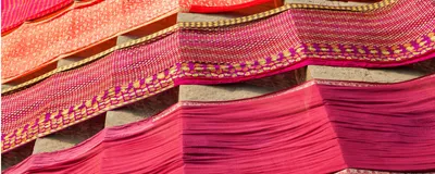 Drying cloths dyed with a red pigment.