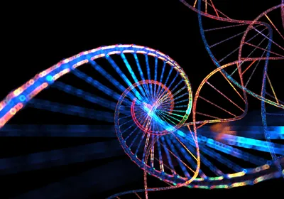 Multicolored abstract image of DNA on a black background.