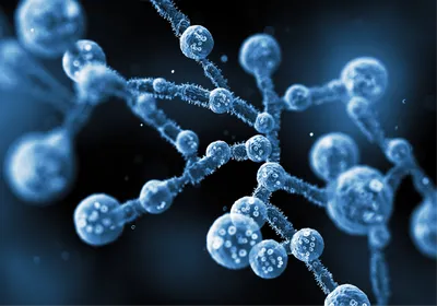 Blue balls connected by blue spiky cuboidal shapes on a blue background.