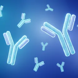 An illustration of glowing antibodies in front of a blue background.