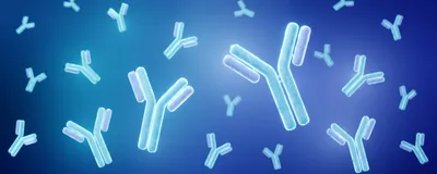 An illustration of glowing antibodies in front of a blue background.