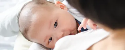 A mother breastfeeding her baby. Molecular insights into milk production could aid improved disganosis and treatment of breastfeeding difficulties.