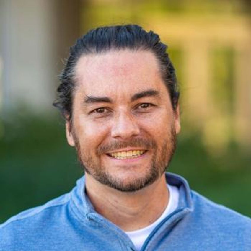 Headshot of biologist Scott Juntti who studies cichlid fish.