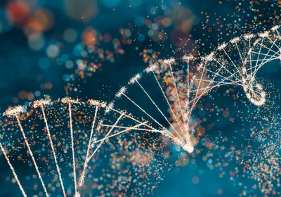 A DNA double helix is expanded into tiny, colored dots, representing potential targets of prime editors.