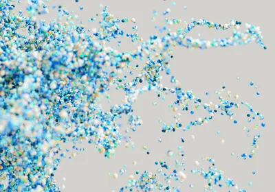 Artistic depiction of nanoparticles in various colors including blues and white Artistic depiction of nanoparticles in various colors including blues and white
