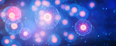 A conceptual image of cells is shown with a bright pink nucleus and points of light representing proteins in the cell.