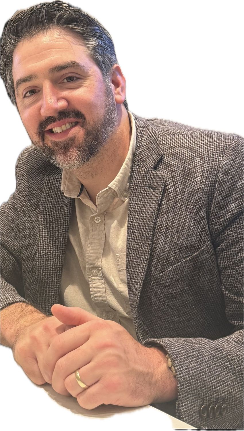 Photograph of Joseph Cichon an anesthesiologist at the University of Pennsylvania. Cichon has short dark hair and is wearing a light brown collared shirt with a darker brown jacket and a gold wedding band. Photograph of Joseph Cichon an anesthesiologist at the University of Pennsylvania. Cichon has short dark hair and is wearing a light brown collared shirt with a darker brown jacket and a gold wedding band.