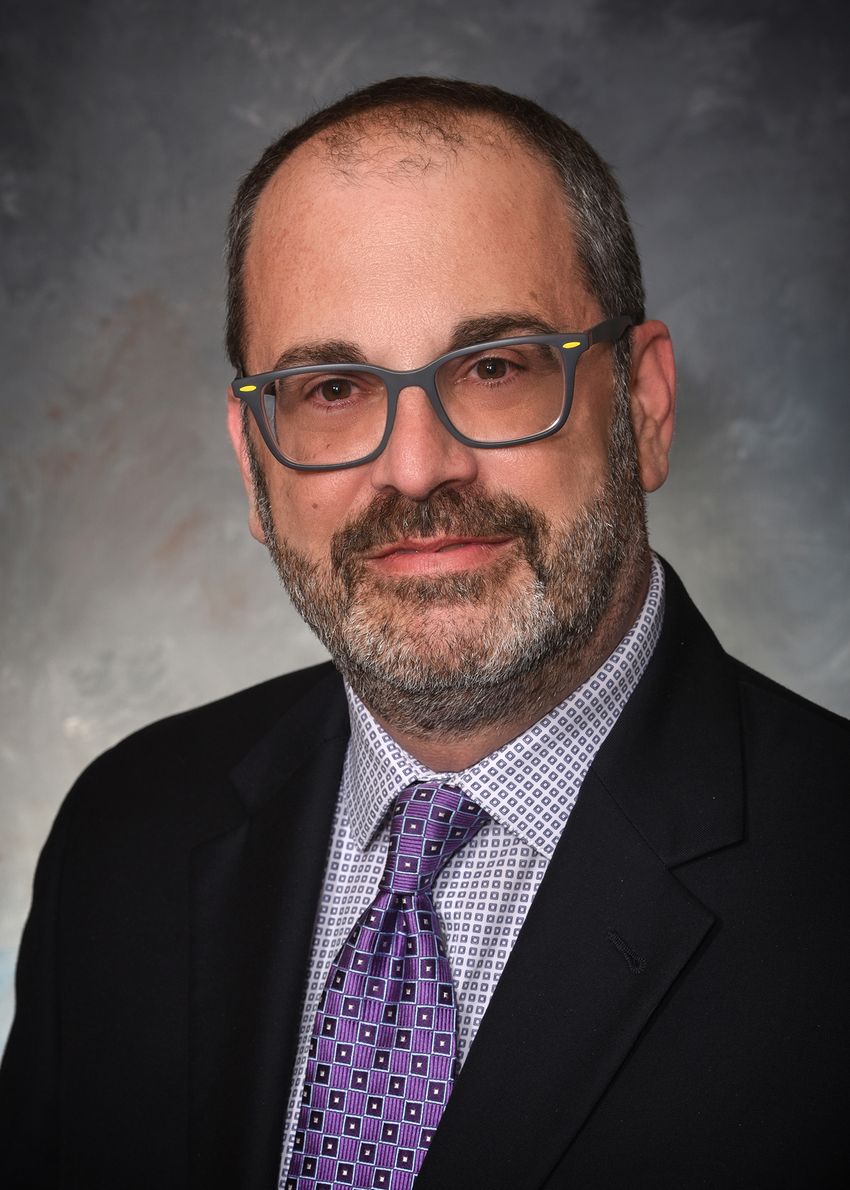 A photograph of Steven Munger, who studies the molecular and cellular basis of odor detection such as that underlying heightened sensitivity to smell, or hyperosmia.