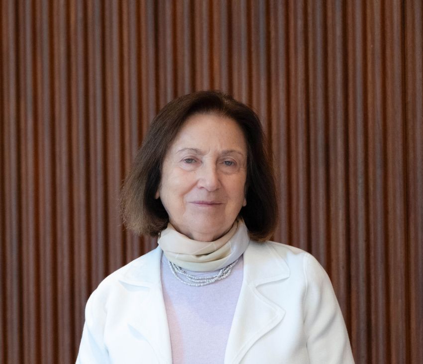 Chemist Svetlana Mojsov wears a light purple top and white blazer in front of a brown backdrop. Chemist Svetlana Mojsov wears a light purple top and white blazer in front of a brown backdrop.