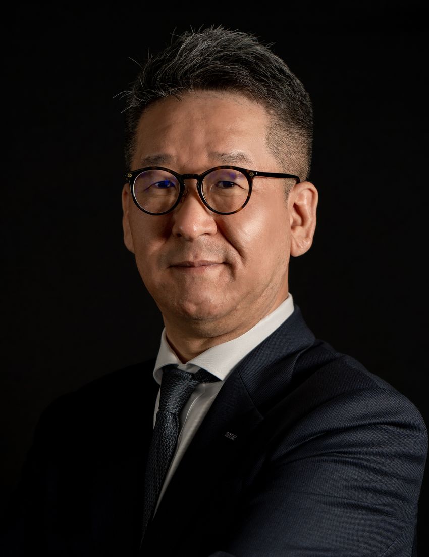 Photograph of Byung-Kwan Cho, a synthetic biologist at the Korean Advanced Institute of Science and Technology. Cho has short, dark hair, black-framed glasses, and is wearing a black suit and tie with a white collared shirt. Photograph of Byung-Kwan Cho, a synthetic biologist at the Korean Advanced Institute of Science and Technology. Cho has short, dark hair, black-framed glasses, and is wearing a black suit and tie with a white collared shirt.