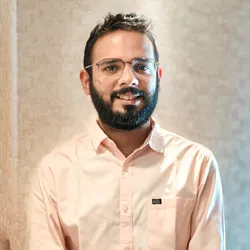 Science journalist Sanket Jain wears a light-colored shirt and glasses in a headshot photo Science journalist Sanket Jain wears a light-colored shirt and glasses in a headshot photo