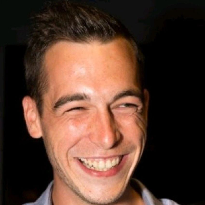 Clément Martin smiles at the camera in front of a black background. Clément Martin smiles at the camera in front of a black background.