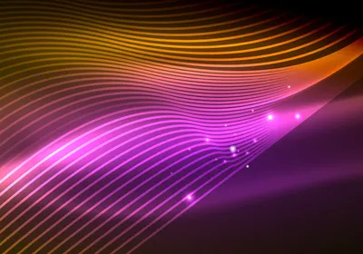 Abstract colorful glowing waves on a black background, representative of bioluminescence. Abstract colorful glowing waves on a black background, representative of bioluminescence.