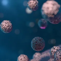 Silvery-purple spheres are released from the surface of a cell against a blue background.