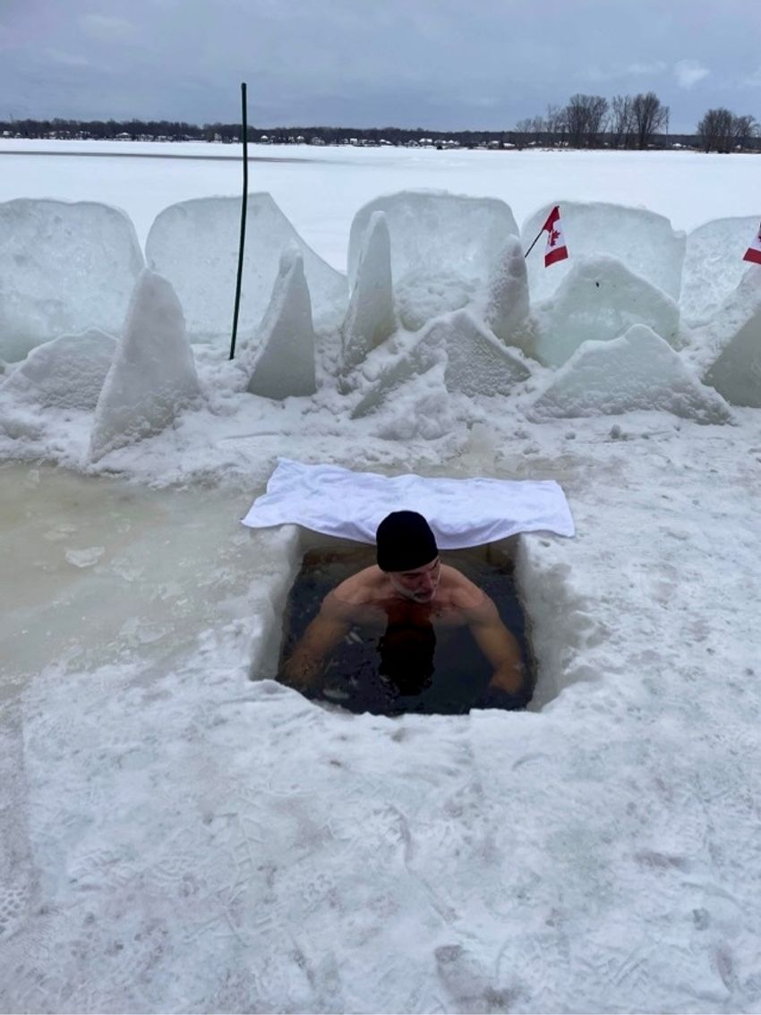 François Haman, who studies energy metabolism and nutrition in extreme environments including cold, sits in a cold-water immersion tank in a snowy landscape. François Haman, who studies energy metabolism and nutrition in extreme environments including cold, sits in a cold-water immersion tank in a snowy landscape.