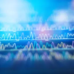 An image of a DNA sequencing spectrum with a radial blur filter applied. An image of a DNA sequencing spectrum with a radial blur filter applied.