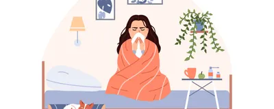 A vector drawing shows a girl wrapped up in an orange blanket sitting on her bed while blowing her nose because she’s sick. Social isolation during sickness helps a person recover faster and prevent spreading the infection.