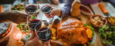Group of people toasting with wine during Thanksgiving dinner at dining table. Better understanding of how alcohol affects the body and why some can’t resist it could help develop better treatments for alcohol use disorders. Group of people toasting with wine during Thanksgiving dinner at dining table. Better understanding of how alcohol affects the body and why some can’t resist it could help develop better treatments for alcohol use disorders.