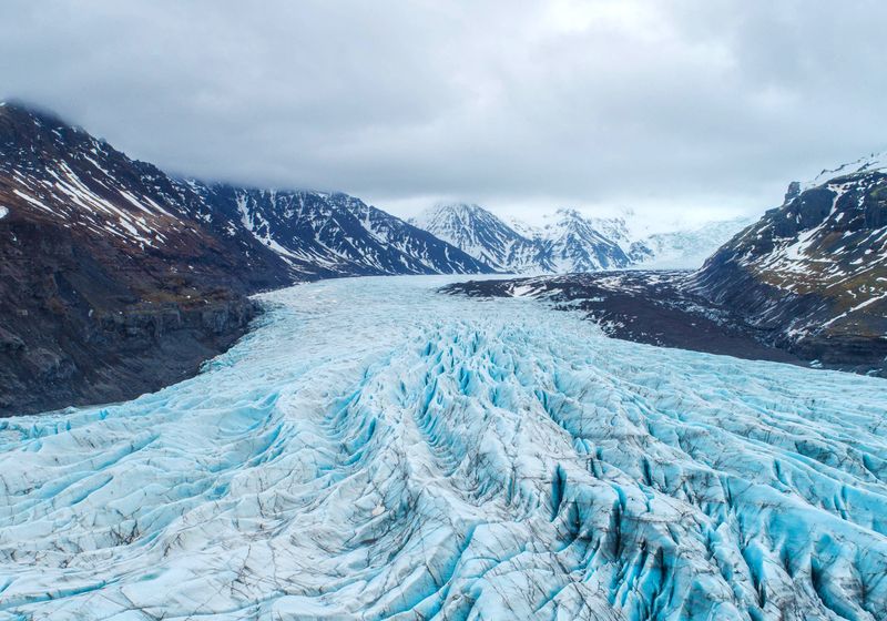 The Ice is Alive: Uncovering the Vanishing World of Glacial Microbes