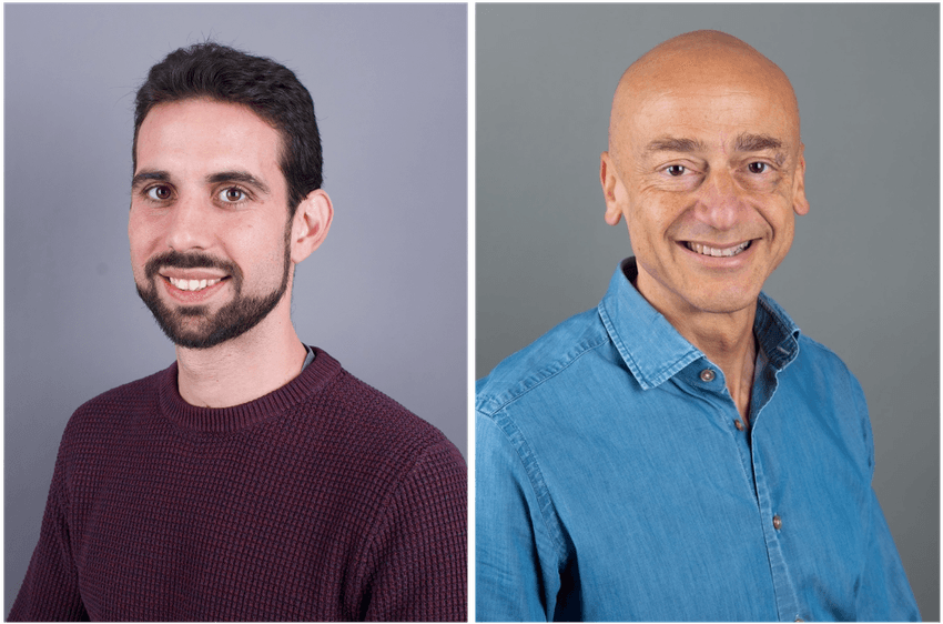 A photograph of Andrés García-García, a biologist at the University of Basel, and Ivan Martin, a tissue engineer at the same institution. García-García, on the left, has short dark hair and is wearing a maroon shirt. Martin, on the right, is wearing a blue collared shirt.