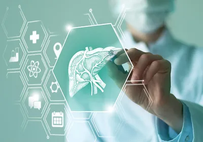 Image of a clinician in the background interacting with a graphic of the liver and other medicine-related icons