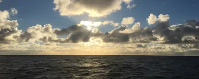 A view of the open ocean as the sun begins to set near Easter Island.