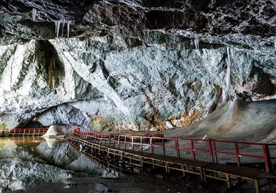 Image of the entrance to an ice cave in Romania.