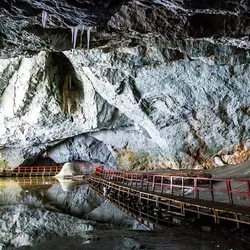 Image of the entrance to an ice cave in Romania.