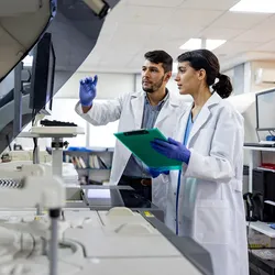Image of a man and a woman in a laboratory.