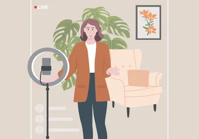 Illustration of Molly Edwards standing in front of her phone set up with a ring light. The word “live” is in the top left hand corner and transparent comment boxes are floating in the bottom left hand corner, making it look like it is a social media video. Edwards has a tall, leafy plant behind her and prints of other flowering plants on her walls. 