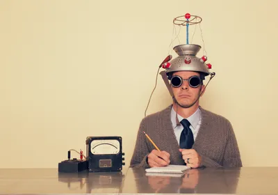 A man wearing a contraption, indicating quirky and funny science.