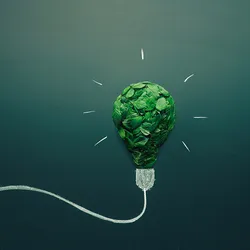A lightbulb filled with green leaves, symbolizing sustainable laboratory science practices