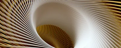 Abstract metallic spiral pattern evoking precision, motion, and engineered performance