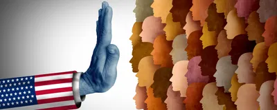 Photo of an arm wearing an American flag sleeve holding a hand up against a crowd of skin-toned silhouettes, representing recent restrictions in hiring international research talent on H-1B visas.