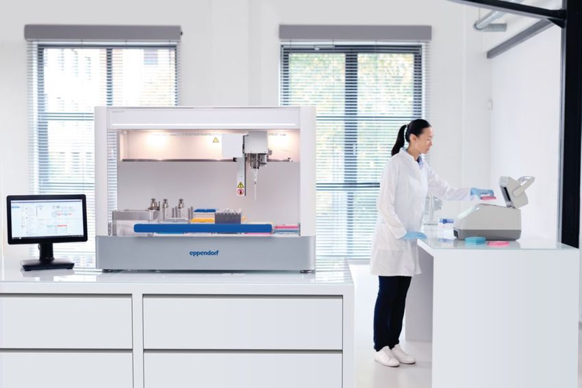 Image of a laboratory with an Eppendorf automated pipetting system in the foreground and a scientist in the background. Image of a laboratory with an Eppendorf automated pipetting system in the foreground and a scientist in the background.