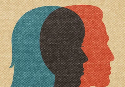 Overlapping silhouettes of a woman and a man, signifying sex differences in brain gene expression.  