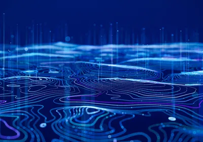 Image of an abstract visualization of a digital terrain. Glowing particles and lines represent data flow and network connections over a blue, futuristic surface.