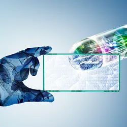 A hand overlayed with cells hold a slide with ones and zeros on it to represent artificial intelligence code. Behind and above the slide with the code is a multi-colored pill.