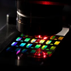 A silicon chip containing 100 million single-molecule sensors on Pumpkinseed’s high-throughput Raman microscope.