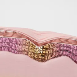 3D illustration of a skin cross section showing cells of the epidermis and dermis. A divot in the skin represents a healing injury, with the cells beneath it a light brown-yellow color compared to the surrounding pink cells.