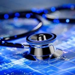 A stethoscope on top of a digital screen