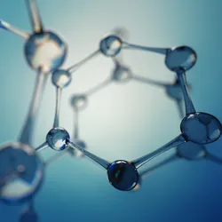 Glass balls form chemical rings, representing the complicated and ring structures of macrocyclic peptides.