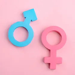 Male and female gender signs on pink background. 
