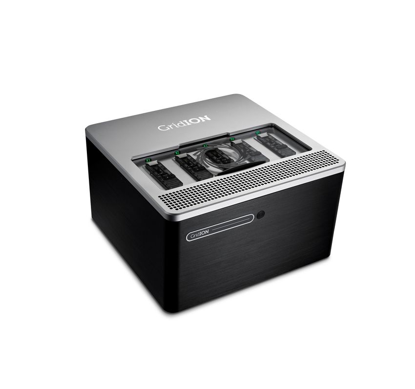 An Oxford Nanopore GridION sequencer – a black and silver cube-shaped instrument with five flow cell ports. An Oxford Nanopore GridION sequencer – a black and silver cube-shaped instrument with five flow cell ports.