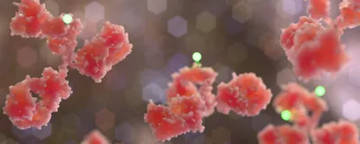Stylized 3D rendering of antibody-drug conjugate molecules with glowing payload particles